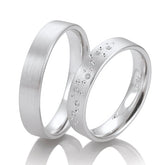 Breuning Sternenhimmel Trauringe mit 7 Diamanten - 48/05728 & 48/05727